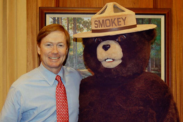 Commissioner-Putnam-and-Smokey-Bear_galleryslide