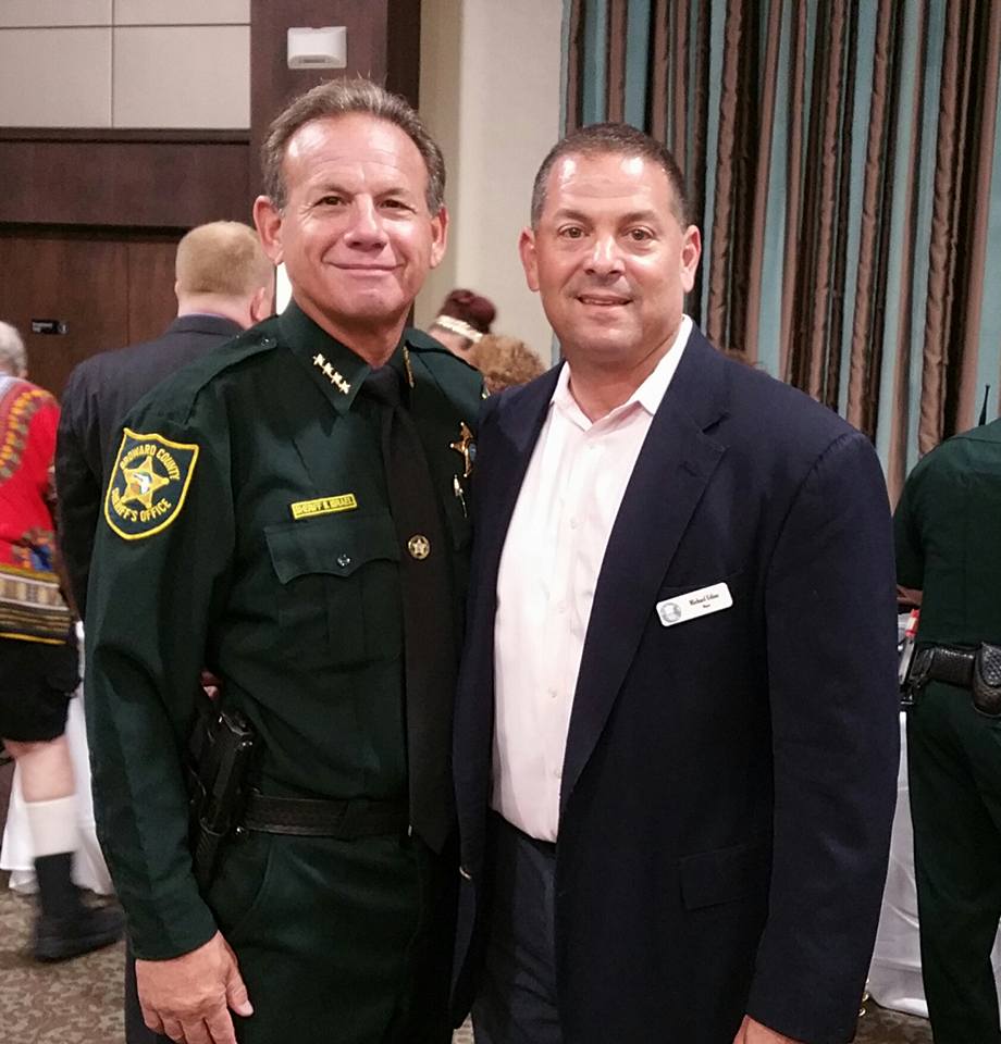 Michael Udine and Broward Sheriff Scott Israel at Kings Point Condominiums